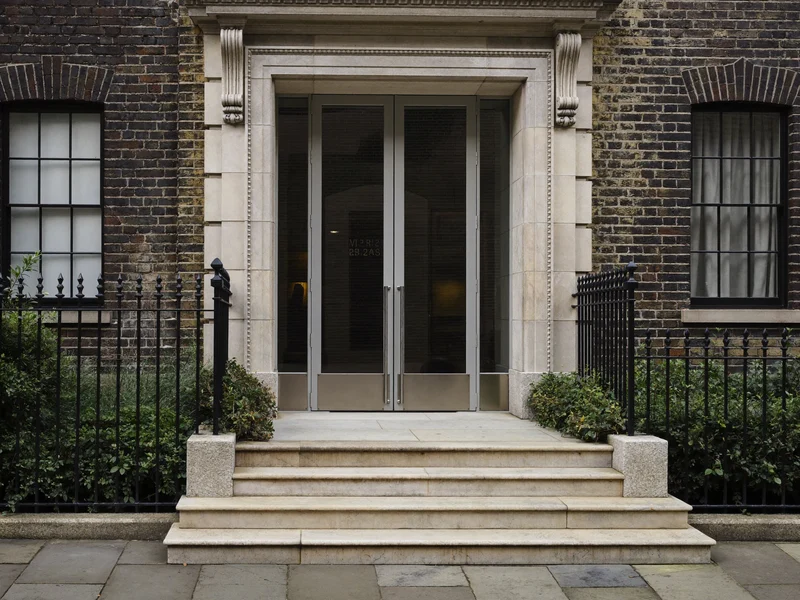 Illustration of an accessible entrance with a gentle ramp on a London street